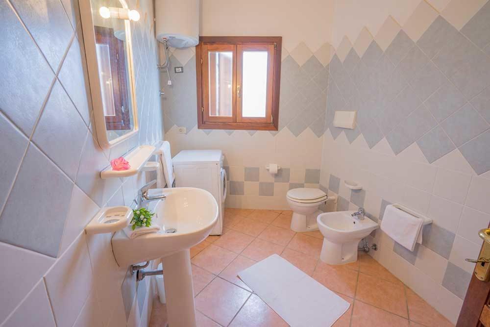 Residence Baia Sant Anna Con Piscina 타나우넬라 외부 사진