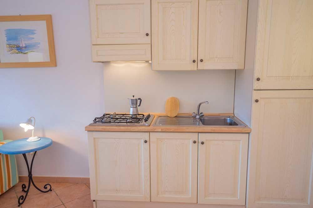 Residence Baia Sant Anna Con Piscina 타나우넬라 외부 사진